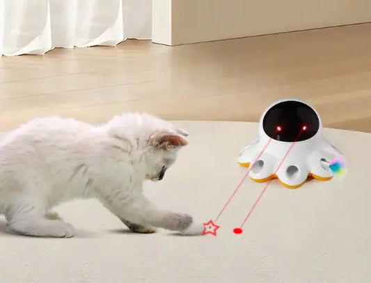 Interactive electric cat toy shaped like an octopus with LED lights and colorful feathers, shown in action as a cat plays with it indoors